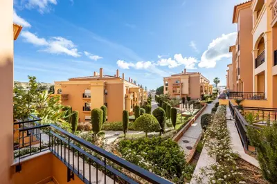 a view from the balcony of a apartment building at Baia da Luz - Tropicana Beach Apartment in Luz