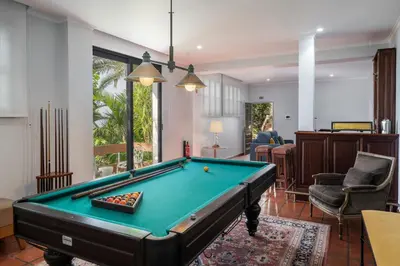 a living room with a pool table at OurMadeira - Vista Grande in Caniço