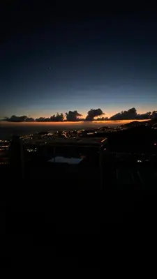 a view of a city at night with the sky at Studio Geek Villa - Open Space - 5m from 5 top attractions - Pool all year round, Dining Pergola, Barbecue - Funchal Matrix Holiday Home in Funchal