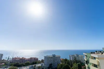 a view of the ocean from a city at Apartamento Vista Azul in Funchal