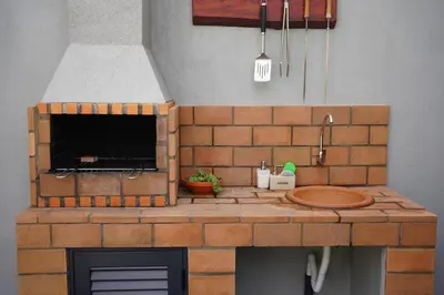 a model of a kitchen with a brick counter top at Sunset Avenue for couple w/ jacuzzi spa hot water in Paul do Mar