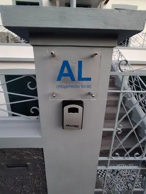 a machine with an al sign on a staircase at Bus Stop House 84 in Funchal