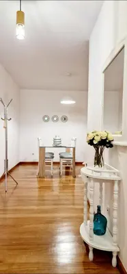 a living room with a table and a dining room at Ocean Pearl Apartment K in Funchal