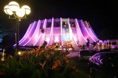 a building with purple lights on it at night at Sea and Sun 4 You - Villa Oliveira in Funchal