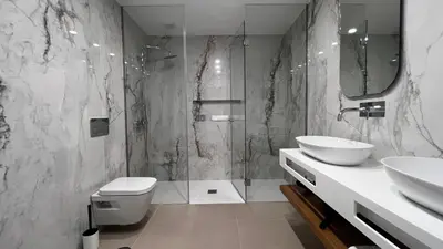 a bathroom with a sink and a toilet and a shower at Villamar in Salema