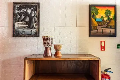 a table with two vases on top of it at Cayenne House in Santa Cruz