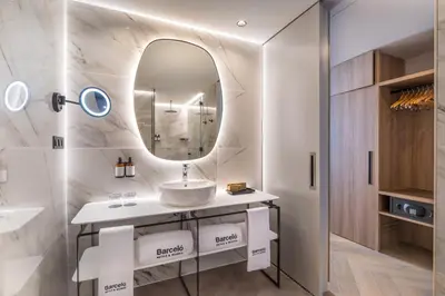 a bathroom with a sink and a mirror at Barceló Funchal Oldtown in Funchal