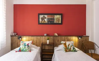 a living room with a gray couch and blue chairs at B65 - Casa Le Ferreira in Praia da Luz in Luz