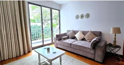 a living room with a couch and a table at Ocean Pearl Apartment W in Funchal