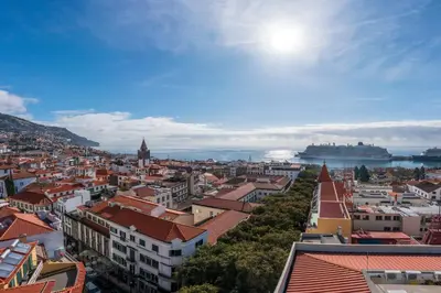 an aerial view of a city with buildings at Art Deco Central Apartments, Funchal in Funchal