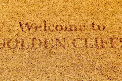 a sign in the sand that says welcome to burbury centre at Ocean view Architectural Modern Villa in Burgau