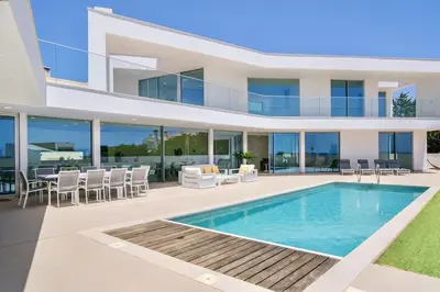 an image of a house with a swimming pool at Ocean view Architectural Modern Villa in Burgau