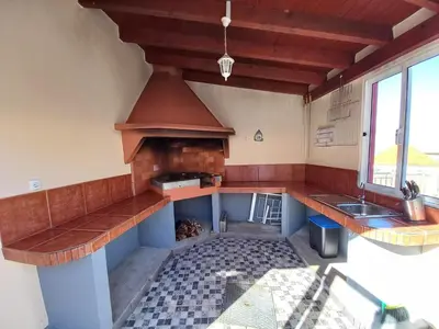 an overhead view of a kitchen with a stove at Casa Abreu Gouveia in Ponta do Pargo in Calheta