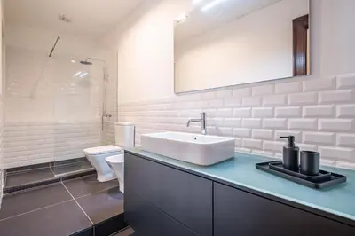 a bathroom with a sink and a toilet at Apartament 6 - By WeHost in Funchal