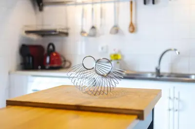 a pair of glasses sitting on top of a kitchen counter at Casa Levante in Sagres