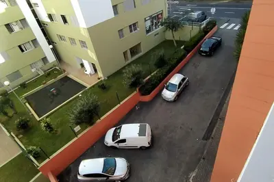 a group of cars parked in a parking lot at MCR Funchal in Funchal