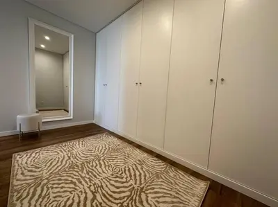 an empty room with a zebra rug on the floor at Deluxe Bay View in Câmara de Lobos