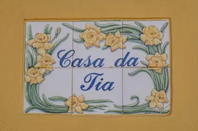 a view of the ocean from the roofs of houses at Casa da Tia in Luz