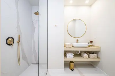 a bathroom with a sink and a mirror at Machim D Arfet House by Homie in Machico
