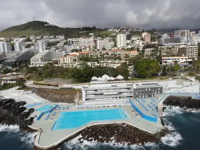an aerial view of a resort with a large swimming pool at Sea and Sun 4 You - Jardins da Imperatriz in Funchal