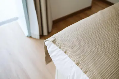 a close up of a bed in a room at Casa das Andorinhas - 1 bedroom apartment sleeps 4 in Câmara de Lobos