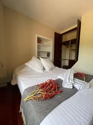a bed with a bunch of vegetables on it at Secluded cottage w pool, oceanside view, 3BR, 3BA in Ponta do Sol
