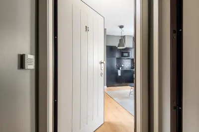 a door leading into a room with a kitchen at Amazing Old Town - Apartments by SBH in Funchal