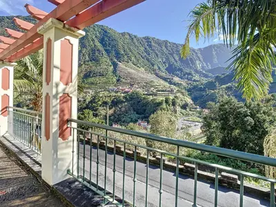 a balcony with a view of a mountain at Mountain View Villa by Atlantic Holiday in São Vicente