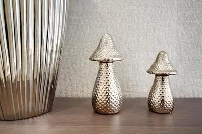 two vases sitting on a table next to a vase at Apartamento Forum View Studio in Funchal