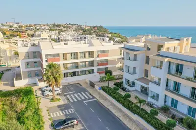 an aerial view of a apartment complex with a parking lot at POLA SeaView Apartment by MOJE Holiday in Lagos