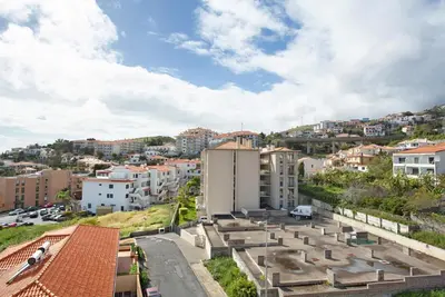 arial view of a city with buildings at Apartamento Lolita com Terraço in Caniço