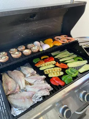 a grill full of different types of vegetables at Villa Sundowner in Prazeres