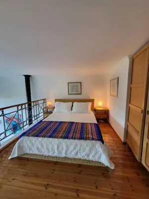 a bedroom with a large bed in a room at Lighthouse Apartment in Luz