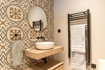 a bathroom with a sink and a mirror at Casa Bella Vista - Calheta in Arco da Calheta