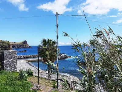 a view of the ocean from a beach at MCStylo - Varandas Falésia in Caniço