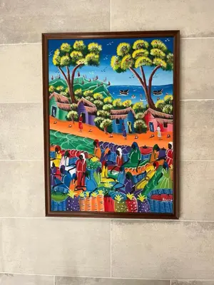 a painting hanging on a wall in at Charming Funchal Studio II in Funchal