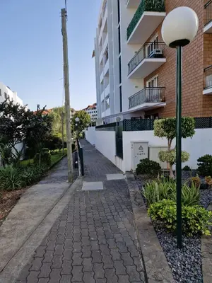 an empty street in front of a building at Lovely Apartment Funchal in Funchal