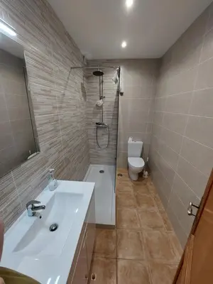 a bathroom with a sink and a toilet at Casa Luna, Burgau - Luz, Lagos in Burgau