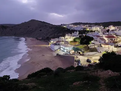 a view of a beach with houses and the ocean at Casa Luna, Burgau - Luz, Lagos in Burgau