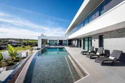 an image of a house with a swimming pool at Vila Luna B&B in Lagos