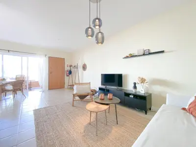 a living room with a couch and a table at Cozy Retreat for Couples in Burgau #1937 in Burgau