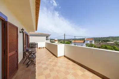 a balcony of a house with a view at A56 - Westway Rossio Holiday Place in Luz