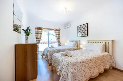 a bathroom with a toilet and a sink and a shower at CoolHouses Algarve Burgau, 3 Bed w/ plunge pool, close to village centre, Casa Boa Vida in Luz