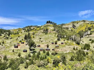 an aerial view of a mountain with cabins on it at Mountain Eco Shelter 8 in Funchal