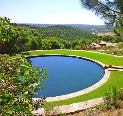 a conceptual plan of a house in a park at Casa dos Sonhos, private terrace, quiet location, walking to village, ecological pool, pets considered, nature friendly in Barão de São João
