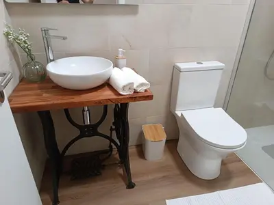 a bathroom with a sink and a toilet at Kings B&B Santa Cruz in Santa Cruz