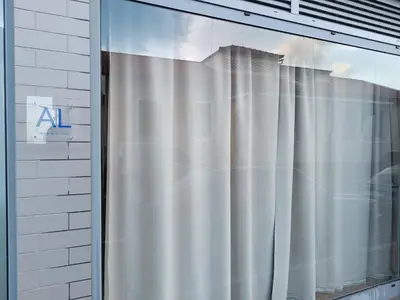 a window with a white shower curtain in a room at Kings B&B Santa Cruz in Santa Cruz