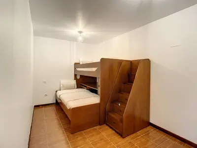 a small room with a bunk bed in a room at Villa Formosa View by Atlantic Holiday in Funchal