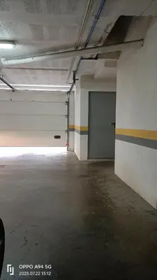 an empty parking garage with a room with a door at Suite Palms in Funchal