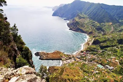 a view of the ocean from a mountain at Terra Batista house in Porto da Cruz